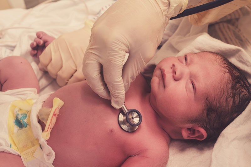 Newborn getting a heart check